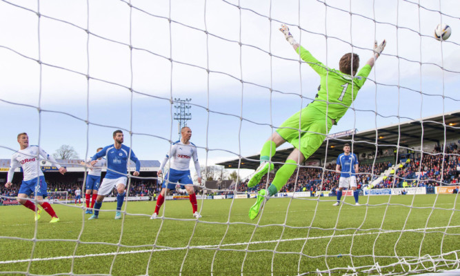 Dean Shiels (left) heads it home to put his side 2-1 up.