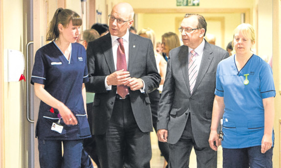 From left: senior charge nurse Jane Maxtone, John Swinney MSP, NHS Tayside chairman Sandy Watson and senior staff nurse Helen Aitchison at Blairgowrie hospital.