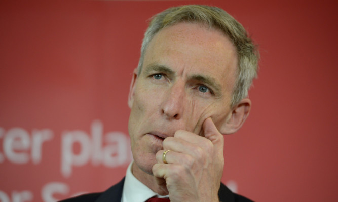 Jim Murphy has said he will carry on as Scottish Labour leader despite the disastrous loss at the election.