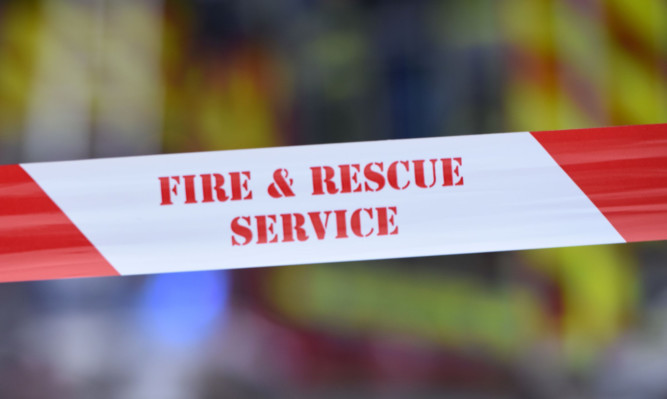 08.05.15 - FOR FILE - pictured at the scene of the fire on Princes Street, Dundee is the Fire and Rescue Service cordon tape