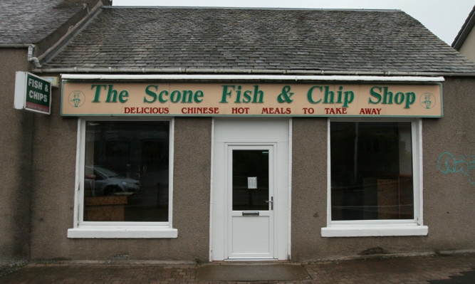 Hughes took the charity box from the Scone Fish and Chip Shop.