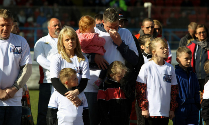 Keir's family and friends during the tribute.