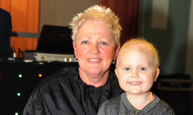 Margaret with four-year-old cancer patient Agatha.
