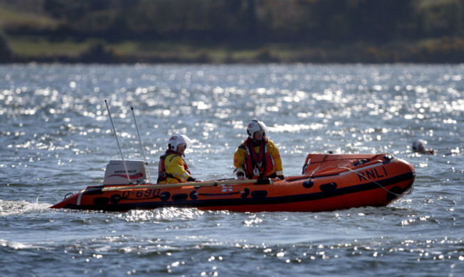 The coastguard were called to find a missing swimmer off St Andrews.
