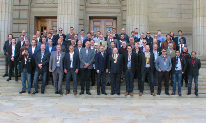 The international group are welcomed to Dundee.