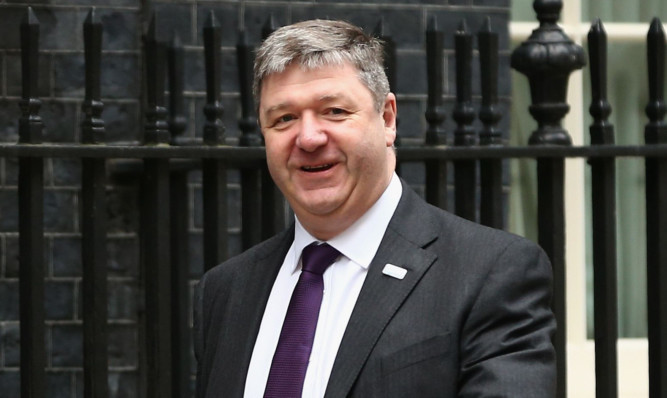 Alistair Carmichael lost his position in Cabinet and is under pressure to stand down as an MP.