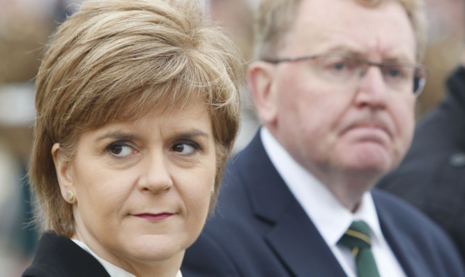 David Mundell appeared alongside First Minister Nicola Sturgeon at a Quintinshill rail crash memorial on Friday.