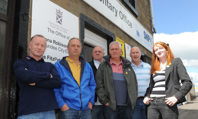 Ron Heeney, Ronnie Halliburton, Graham Nelson, Richard Murray, Colin Coupar and Ailsa Weir outside Ms Robisons constituency office in Dundee.