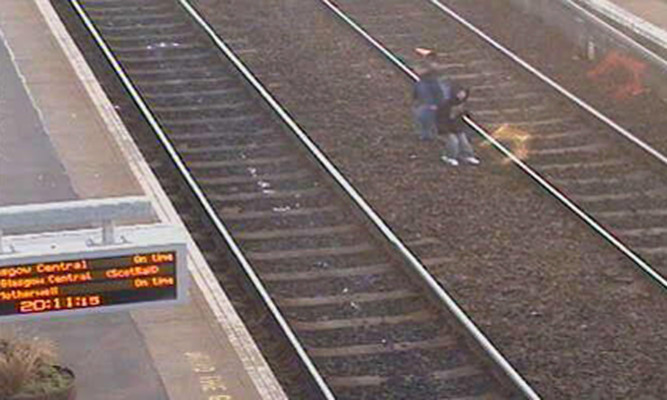 Young children captured on CCTV  illegally crossing the tracks at Wester Hailes train station in Edinburgh.