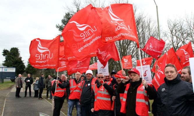 Striking porters at Ninewells Hospital. The news that both sides have agreed to talks in an effort to resolve the pay dispute has been warmly welcomed by all concerned.