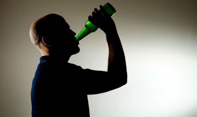 PICTURE POSED BY MODEL 

Stock photo shows a man drinking a bottle of beer. PRESS ASSOCIATION Photo. Picture date: Monday March 9, 2015. Photo credit should read: Dominic Lipinski/PA Wire