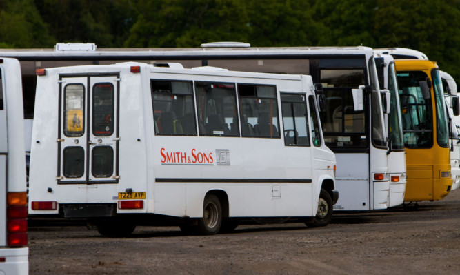 Smith and Sons have been kept on by Perth and Kinross Council despite inspectors finding faults with some buses.