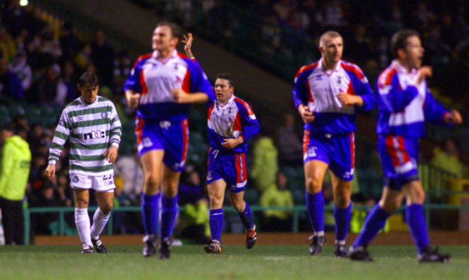 Barry Wilson (centre) celebrates during the famous Scottish Cup victory over Celtic in February 2000.