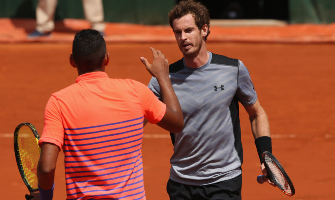 Andy Murray shakes hands with Nick Kyrgios  after their match.