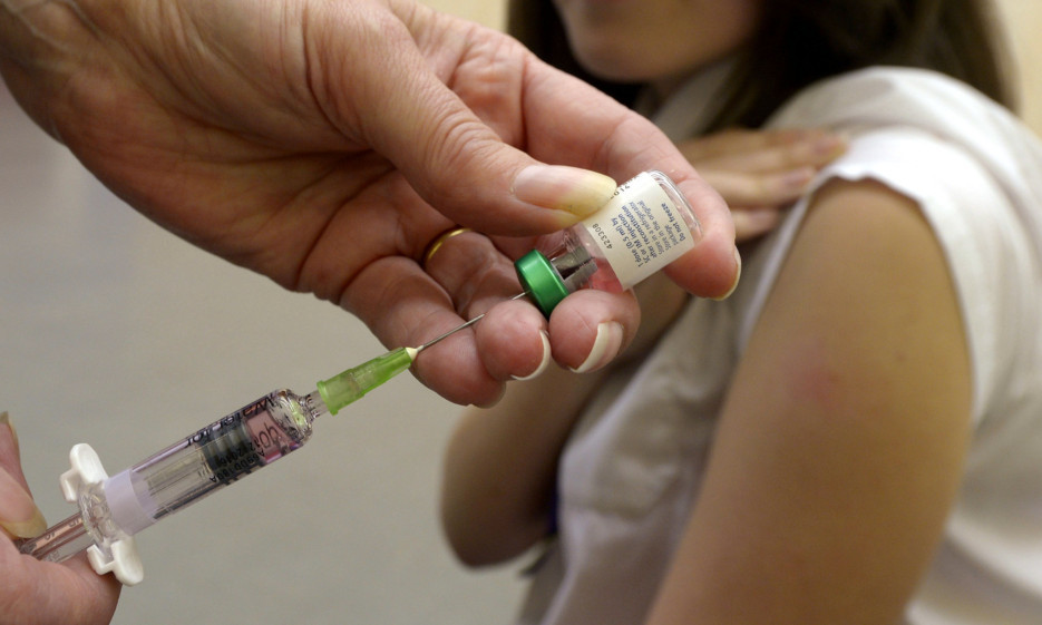 Lucy Butler,15, getting ready to have her measles jab at All Saints School in Ingleby Barwick, Teesside as a national vaccination catch-up campaign has been launched to curb a rise in measles cases in England. PRESS ASSOCIATION Photo. Picture date: Thursday April 25, 2013. See PA story HEALTH Measles. Photo credit should read: Owen Humphreys/PA Wire