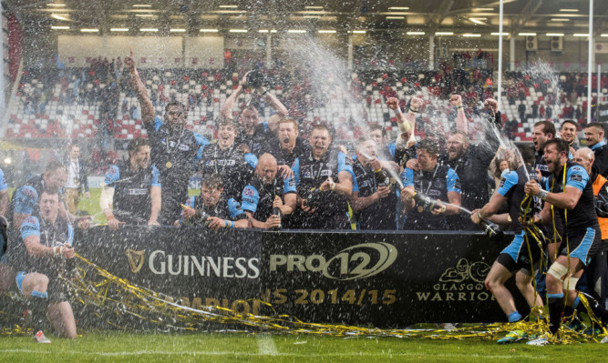 Glasgow celebrate after their final win over Munster.