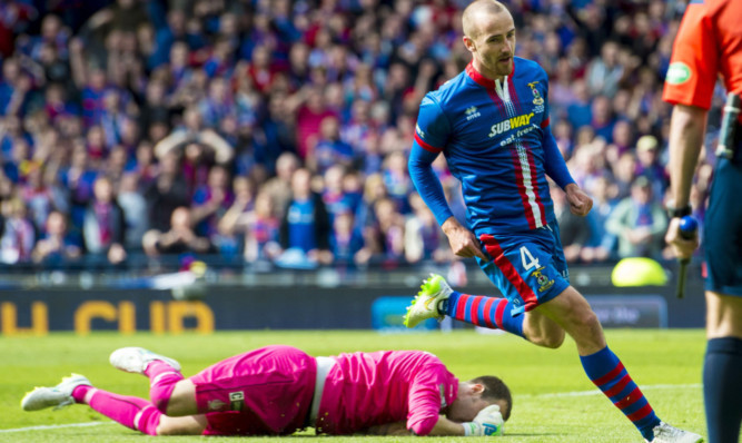 Inverness CT's James Vincent celebrates his winning.