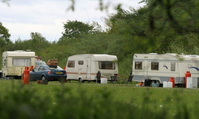 Travellers camped out at Lochty Meadows on Monday.