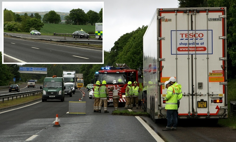 COURIER, DOUGIE NICOLSON, 02/06/15, NEWS.
Pic shows the lorry on the hard shoulder of the northbound carrigeway of the M90, just north of Bridge Of Earn today, Tuesday 2nd June 2015. Story by Perth.