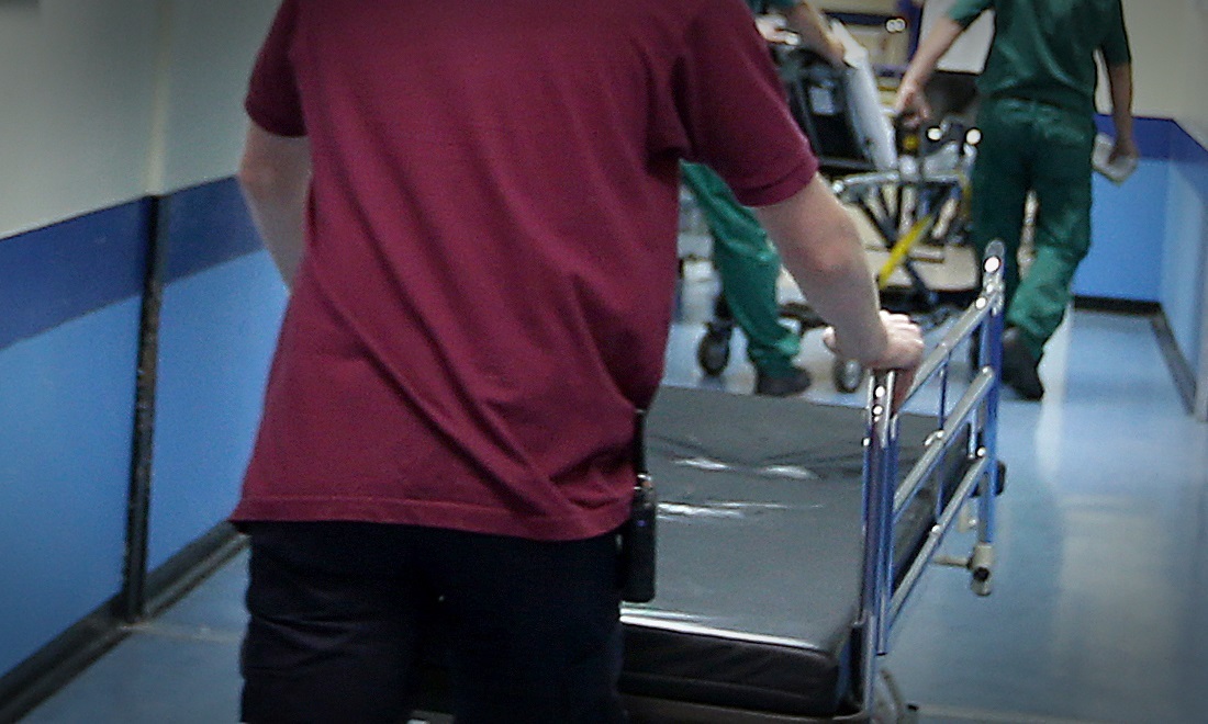 A porter pushes a trolley at the Royal Liverpool University Hospital, Liverpool.