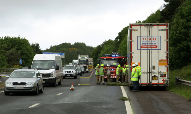 Repair work to the road is still taking place after Tuesday's crash.