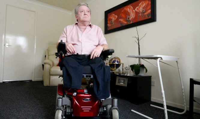 Amputee Walter Watson at home in Aberdeen.