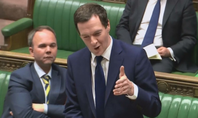 Chancellor George Osborne speaks in the House of Commons during a debate on the Queens Speech.