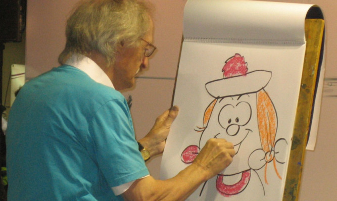 Jim Petrie sketching Minnie the Minx.