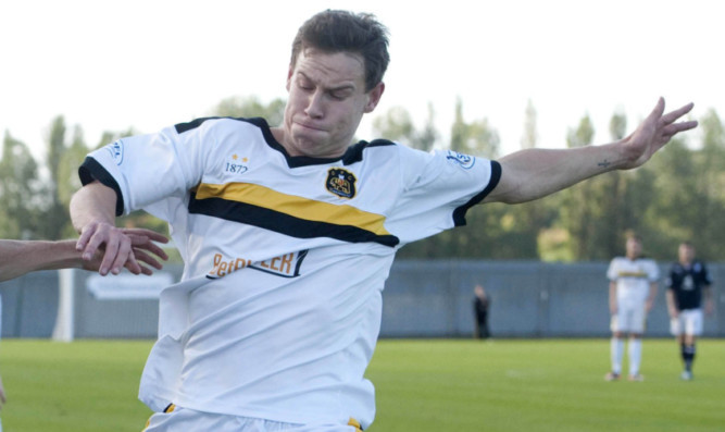 Mitch Megginson in action for Dumbarton.