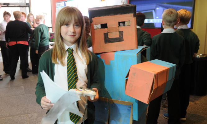 From left: Ashley Henderson and Kaya Hindmarch were among the youngsters to present the designs for the Dundee Waterfront that they have created using Xbox and Playstation 3 consoles.