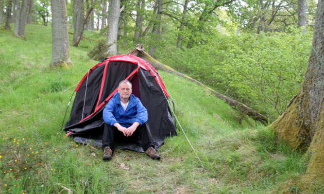 Alex at the tent he and his nephew fled from in the night.