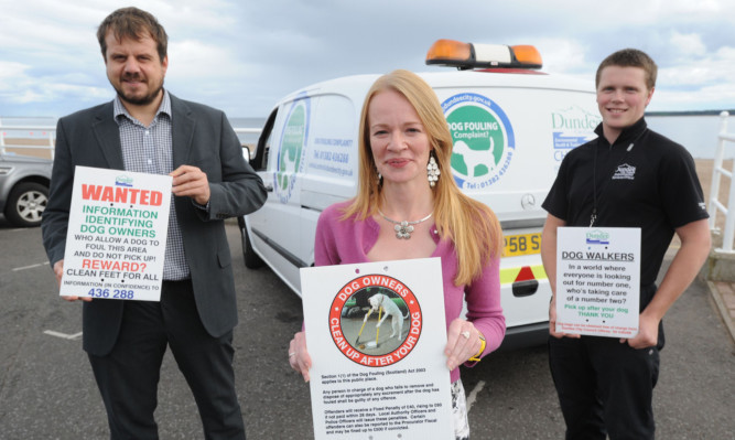 Councillors Craig Melville and Vari McDonald with animal control officer Ben Soutar (right) at the launch of a recent effort to crack down on dog fouling in Dundee.