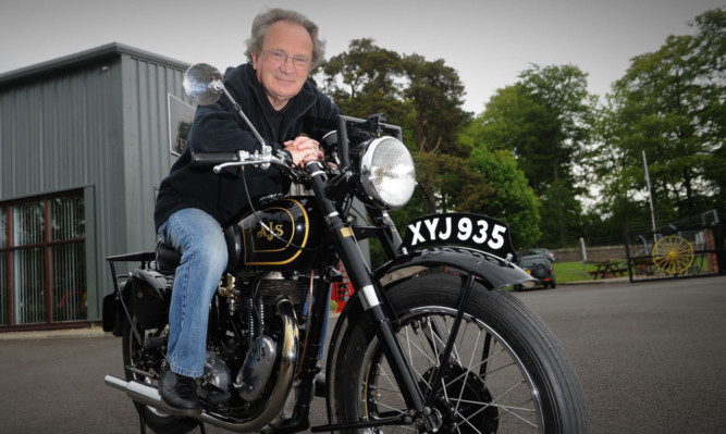 Revved up and ready to go: Stan with his 67-year-old AJS Model 18.