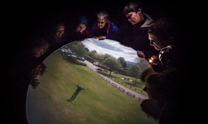 Visitors enjoying the camera obscura.