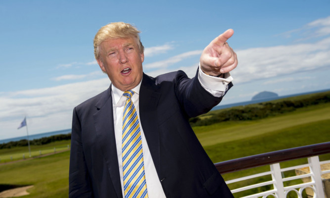 Donald Trump addresses the media as he formally opens the new Trump Turnberry Clubhouse.