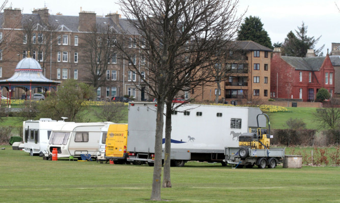 Dundee City Council is being asked why Travellers were not hit with fines when they were parked on nearby land.