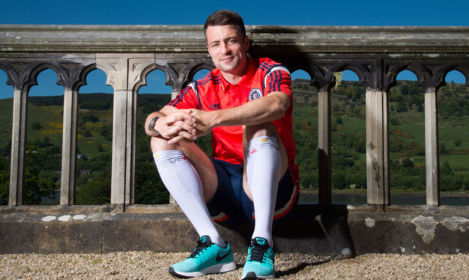 Scotland's Russell Martin relaxes ahead of the big match.