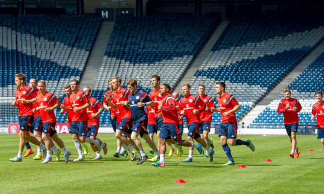 The Scotland squad are put through their paces at Hampden.