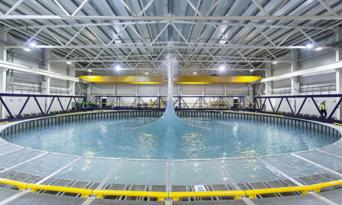 The FloWave Ocean Energy Research Facility features a testing tank that can recreate various sea conditions that wave energy machines will have to be able to withstand in a real-life situation.