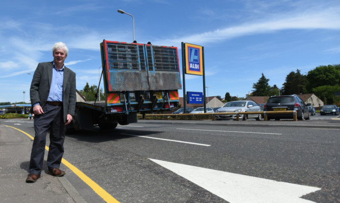 Councillor Bryan Poole at the area of concern close to the new Aldi in Cupar.