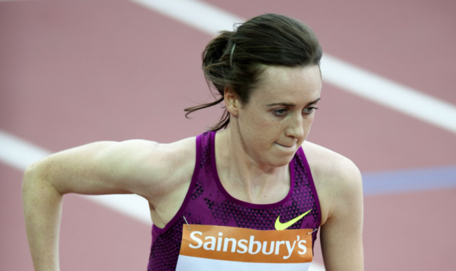 Laura Muir held off challengers to win in seasons best of four minutes 00.39 seconds.