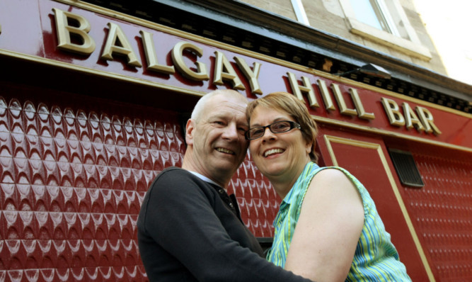 Nikki Newbury and Larry Scott outside the pub where they will soon marry.