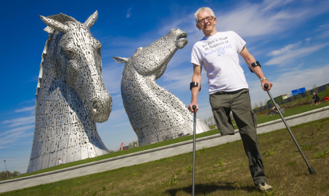 Dr Bob Grant, who lost his leg to cancer, launches the fundraising drive for his 117-mile walk for Maggies at the Kelpies.