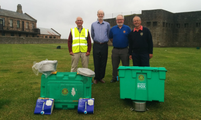 From left: (left to right): Pictured at broughty Castle with the items to be donated to the Nepal appeal are Rotarians Donald MacKerron, Monifieth; Ron Elder, Claverhouse; Jim Crowe, Abertay, and David Laing, Dundee.