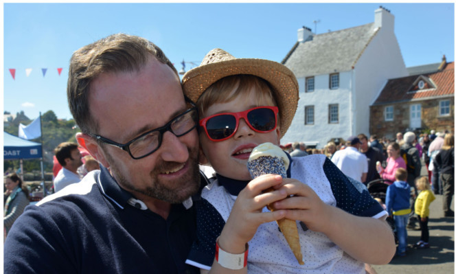 Ian Fyfe and his four-year-old son Curtis enjoying an ice cream.