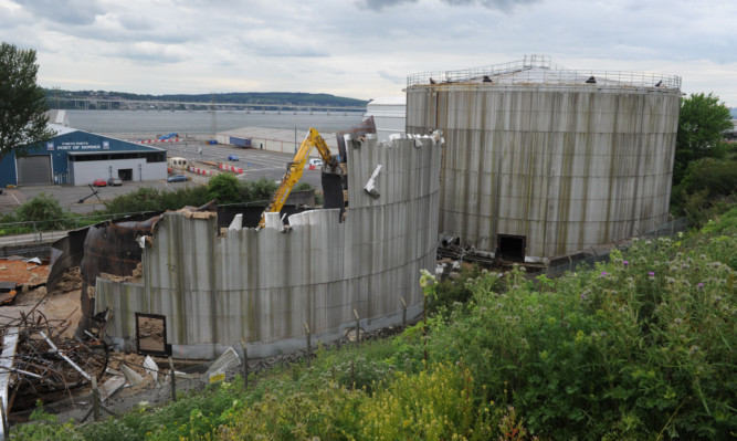The Nynas Refinery storage tanks being demolished.