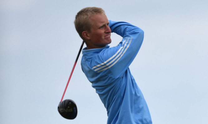 Well positioned: Swedens Marcus Kinhult, the favourite as the third-ranked amateur player in the world, on his way to a 70 at Carnoustie.