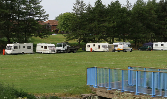 Travellers camped out in Finlathen Park in Dundee.