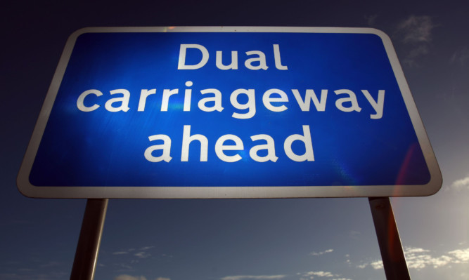 Kris Miller, Courier, 06/11/13. Picture today shows Dual Carriageway ahead sign near Luncarty on the A9 for files.