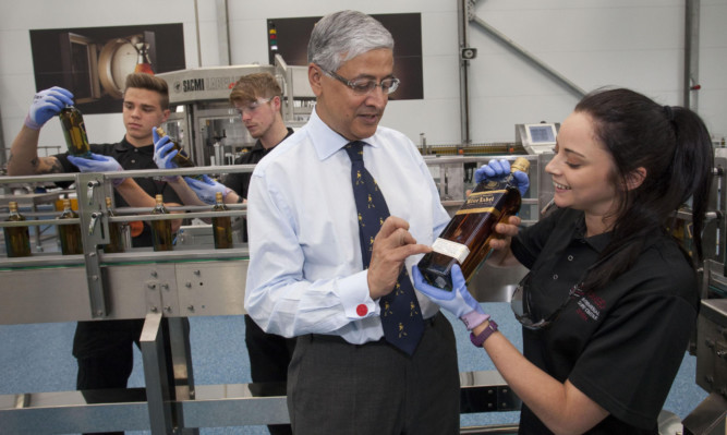 Chief executive Ivan Menezes during his tour of Diageos Leven packaging plant.